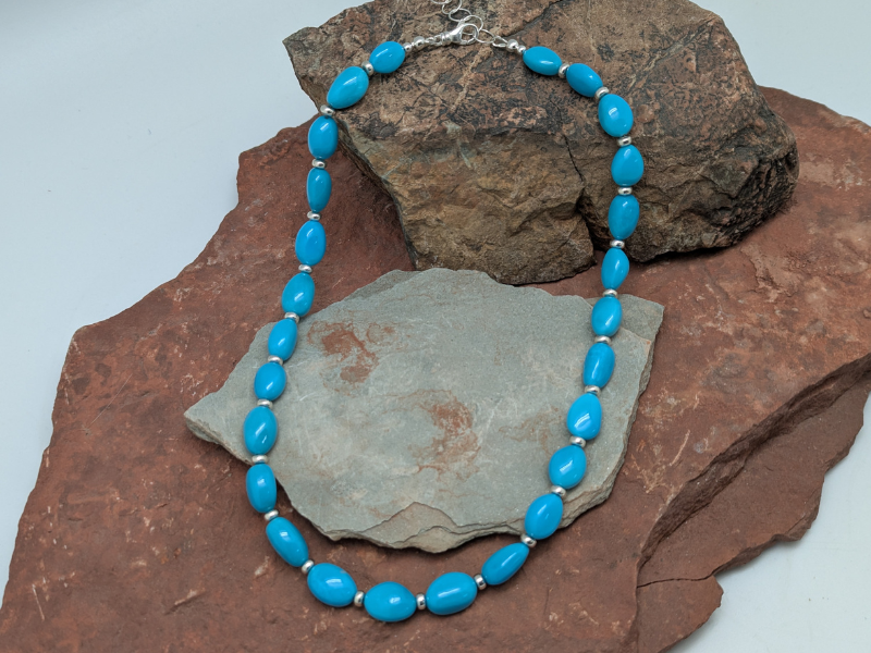 Rare Sleeping Beauty turquoise is featured in this one of a kind necklace.