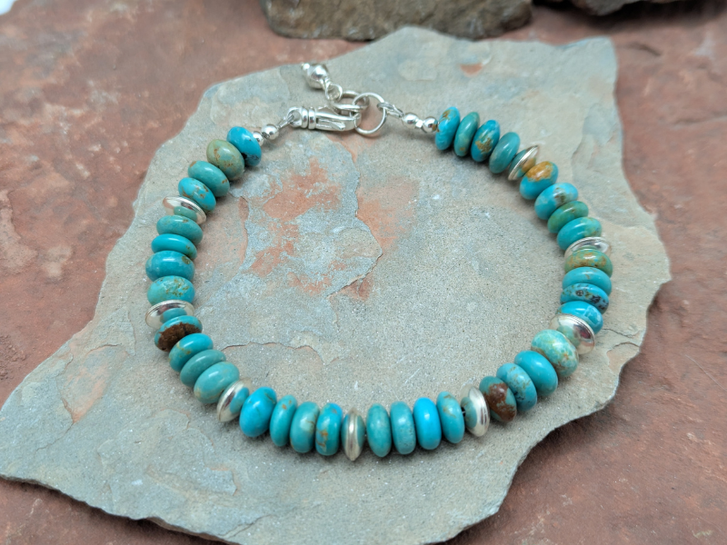 Turquoise bracelet accented with sterling silver.